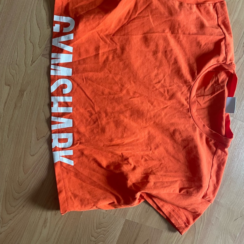 Vibrant Orange Gymshark crop Tee with White Logo